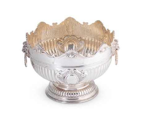 maker and date indecipherable, probably early 20th century, of traditional circular form, gadrooned lower with two vacant scr