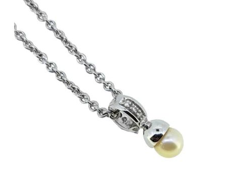 the pendant is set with a 6.5mm off-round cream coloured cultured pearl, suspended from a diamond set detachable bale, length