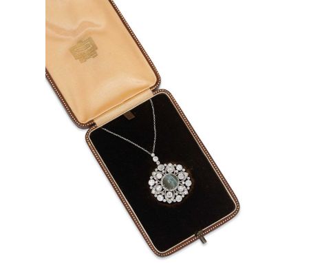 the stylized flower with a claw set round cabochon cats eye chrysoberyl, approximate diameter 12.2mm, estimated approximate w