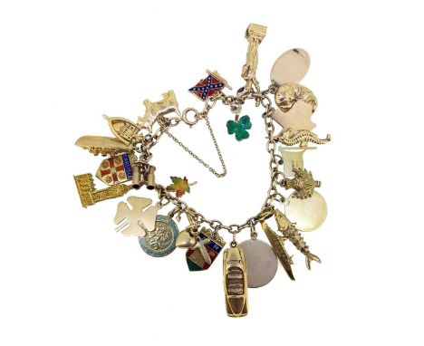 oval belcher links with twenty four assorted charms to include, the statue of Liberty, a sea horse and an articulated fish, a