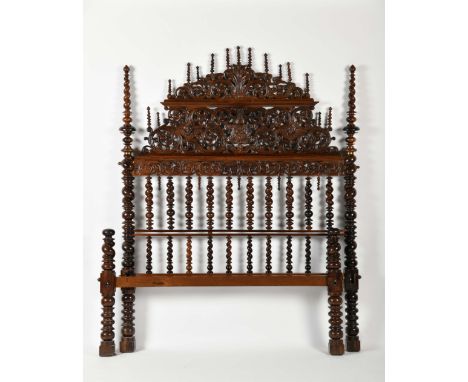A bobbin bed, Brazilian rosewood, scalloped and pierced headboard with carvings "Coat of arms of the Order of Saint Francis" 
