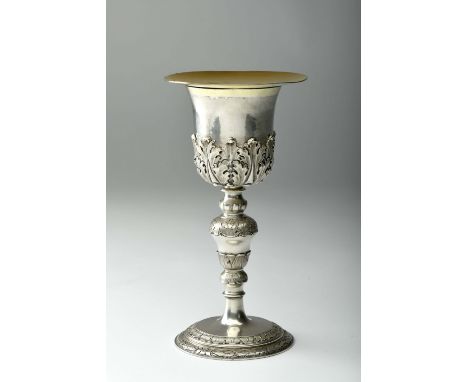 A chalice with paten and ladle, silver, chalice with decoration en relief "Leaves", gilt chalice interior and part of the pat