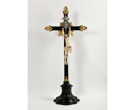 Crucified Christ, partially painted and gilt ivory sculpture, Brazilian rosewood base and cross with gilt carvings and silver