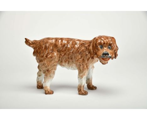 A hound, porcelain sculpture probably from Paris, polychrome decoration, French, 19th C., marked. Notes: the brand purposely 