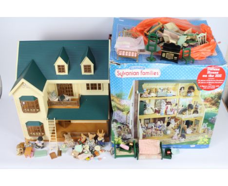 Epoch - Sylvanian Families - A boxed Sylvanian Families House On The Hill # 4911. The house comes with 9 x figures a quantity