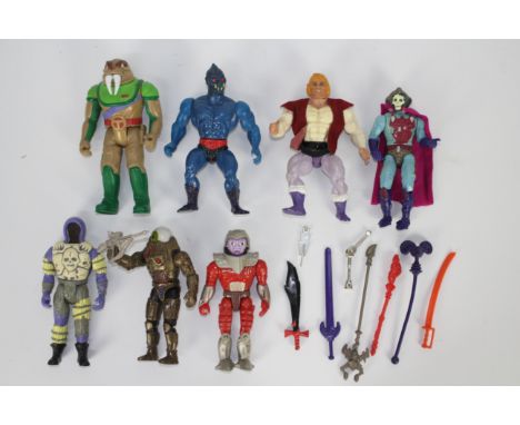 Mattel - He-Man - A collection of He-Man figures including Optikk, Prince Adam, Webstor, Flogg and others with some accessori