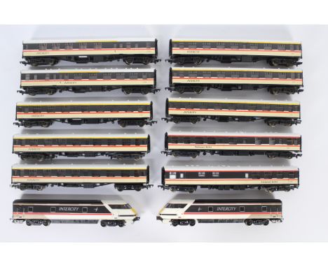 Bachmann, Hornby, Replica Railways - A rake of OO gauge 12 Inter City Swallow trailers and passenger coaches. Lot includes Ho