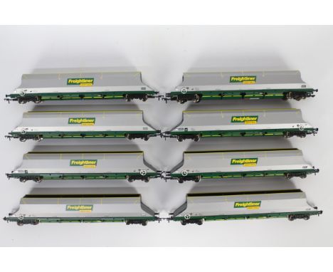 Bachmann - A rake of 8 Bachmann #38030 HHA 100T Bogie Hopper Wagons in Freightliner Heavy Haul livery. The models appear to b