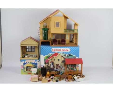 Tomy - Sylvanian Families - 2 x boxed items, Woodland Lodge with 7 x figures and a quantity of furniture including bathroom s