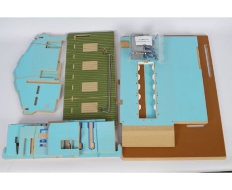 Brushwood Toys - A wooden Brushwood Toys 1:32 scale Herringbone Milking Parlour # BT2000. This model has previously been asse