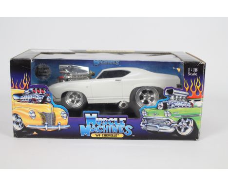 The Original Muscle Machines - A 1:18 scale silver-coloured 'SS 396' 69 Chevelle. Box appears in fair to good condition with 