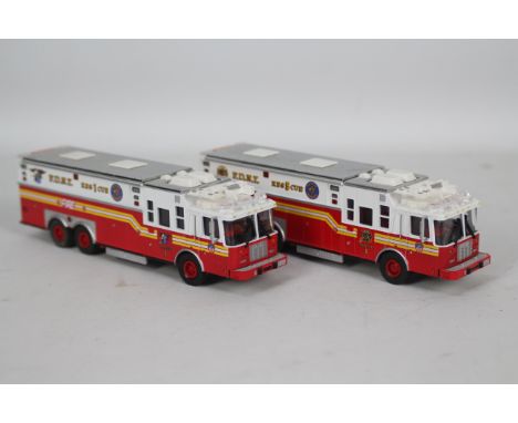 Code 3 Collectibles - 2 x unboxed limited edition 1996 HME/Saulsbury Heavy Rescue Fire Trucks in FDNY livery in 1:64 scale. R