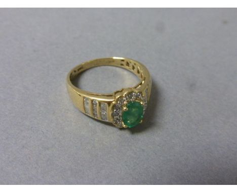 14ct yellow gold, emerald and diamond cluster ring