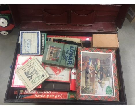 A collection of vintage games, in a tin trunk 