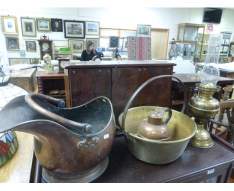 A copper jam pan, along with a copper coal bucket, brass lamp and a Jersey milk churn 