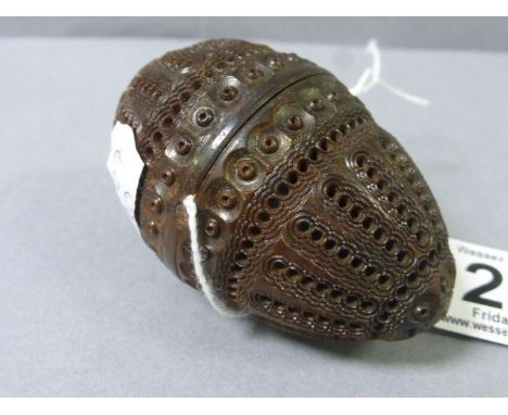 A carved nutmeg grinder, no interior