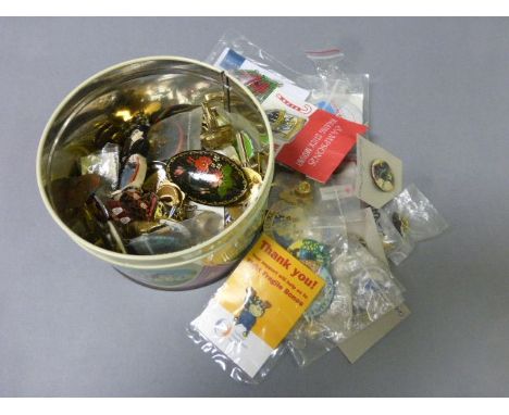 Tin of mixed enamel and other badges