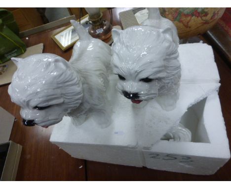 Three large modern ceramic model dogs 
