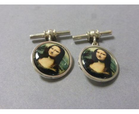 Pair of silver and enamel cufflinks depicting the Mona Lisa