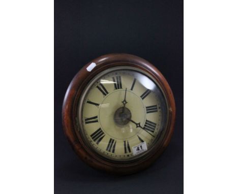 A Victorian postman's alarm clock, in a mahogany surround 
