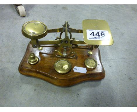 A set of brass letter scales 