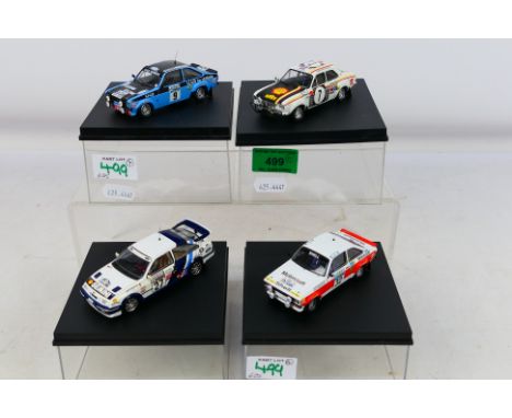 Trofeu - Four boxed 1:43 scale diecast model Rally Cars by Trofeu. Lot includes Trofeu #515 Ford Escort RS1600 1st Safari 197