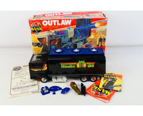 Kenner - Mask - A boxed 1986 Venom Outlaw Oil Tanker / Mobile Headquarters. The model appears in Excellent condition with mos