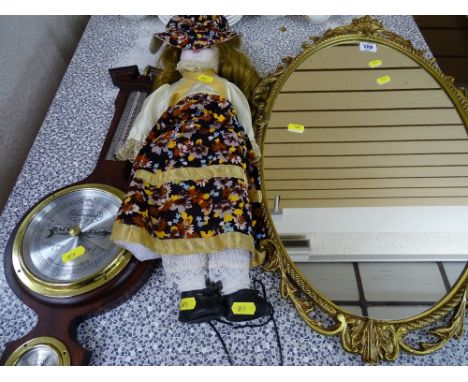 Porcelain headed doll, wall barometer and a gilt framed wall mirror