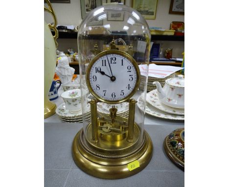 Boule clock under a glass dome