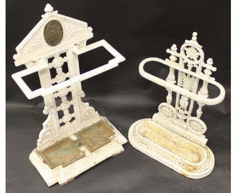 Two 19th Century white painted stick and umbrella stands, one in the manner of Coalbrookedale with twin bead finial circle en