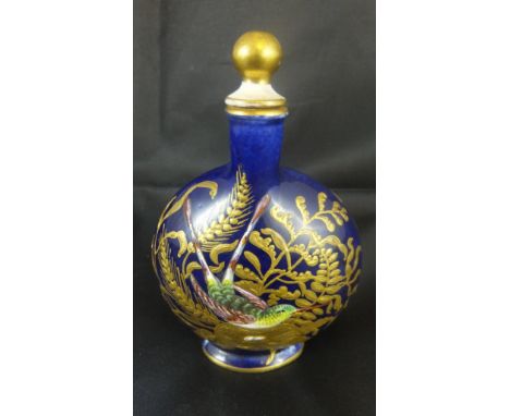 A 19th Century Coalport porcelain double-necked perfume bottle, the blue ground set with enamelled foliate decoration of a bi
