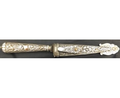 A 19th Century Russian miniature dagger, the silver and yellow metal handle and scabbard with embossed floral decoration and 