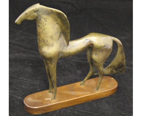 A modernist bronze figure of a horse in the Etruscan manner, on a rounded rectangular base, 20 cm high