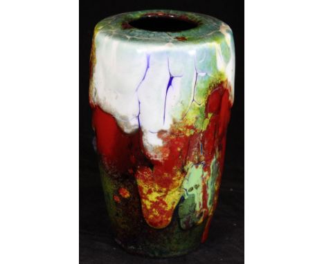 A Royal Doulton Chang vase of tapering form by Harry Nixon, designed by Charles Noke, covered in a volcanic running glaze wit