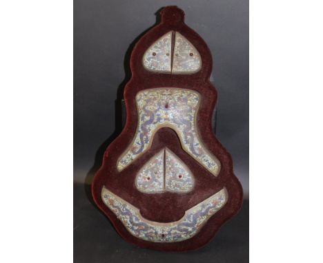 A suite of six 19th Century Chinese cloisonne panels (possibly ceremonial armour), each set with red stones, mounted on a red