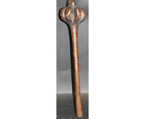 A 19th Century Fijian ula or throwing club, the lobed head with domed pommel, the tapered shaft with incised zigzag geometric