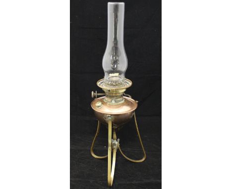A Benson & Co. brass and copper oil lamp with clear glass funnel on a copper reservoir marked "Benson & Co. New Bond Street, 