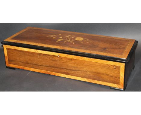 A late 19th Century Swiss twelve air musical box with rosewood and cross-banded floral marquetry inlaid case, bearing label t