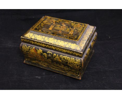 A black lacquered gilded and painted tea caddy of bombé sarcophagus form in the Chinoiserie taste, opening to reveal a remova