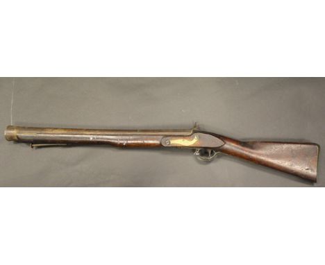 A walnut stocked Blunderbuss with hammer action, the plate stamped "US" (therefore probably the US Navy / Military Issue), wo