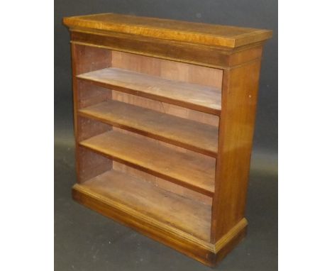 A walnut and crossbanded four-shelf open bookcase on plinth base, 93 cm x 105 cm