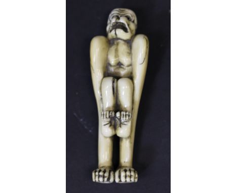 A Japanese carved ivory figure of a monkey with long arms, probably meant to represent Tenaga, with open mouth, signed verso,