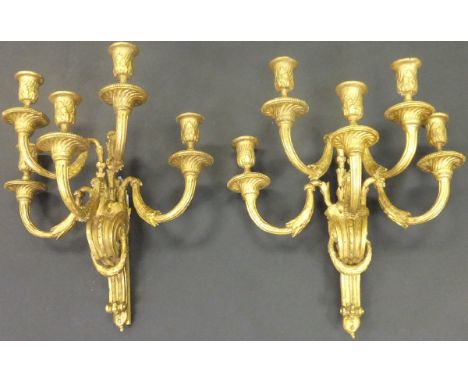 A pair of 19th Century gilt gesso five light wall sconces in the Rococo taste, 45 cm wide x 49cm high 