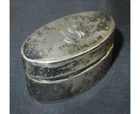 A George III silver nutmeg grater of oval form, the lid with engraved initials (Thomas Willmore, Birmingham, 1799), 4 cm long