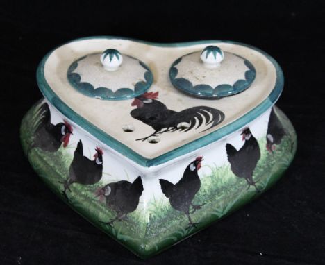 A Weymss ware pottery heart shaped desk stand, decorated with black cockerels and chickens and with green painted rim, the tw