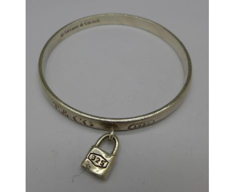 A silver Tiffany & Co. bangle