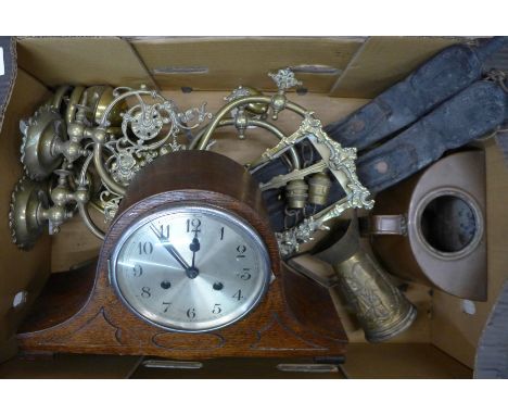 A mantel clock, a pair of brass wall lights converted from gas lights, a copper kettle and a horse crupper