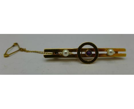 A yellow metal, seed pearl and amethyst brooch (tests as 9ct gold), 2g