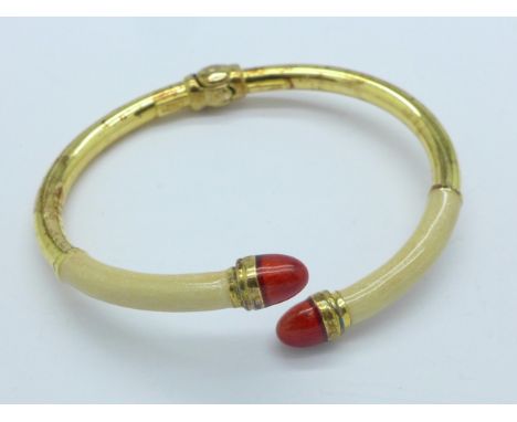 A silver gilt bangle