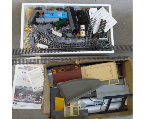 A Lima model train set, buildings, carriages, etc.